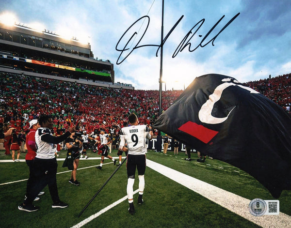 DESMOND RIDDER AUTOGRAPHED CINCINNATI BEARCATS FLAG 8x10 PHOTO BECKETT